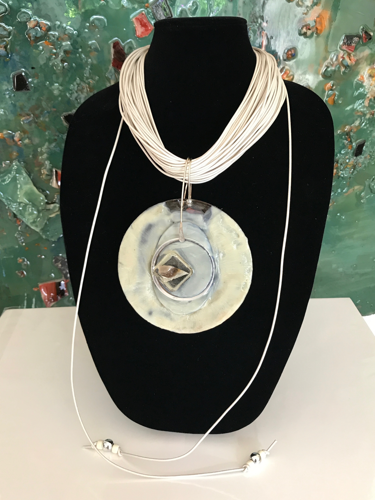 Click here to view White Necklace by Silvana LaCreta Ravena